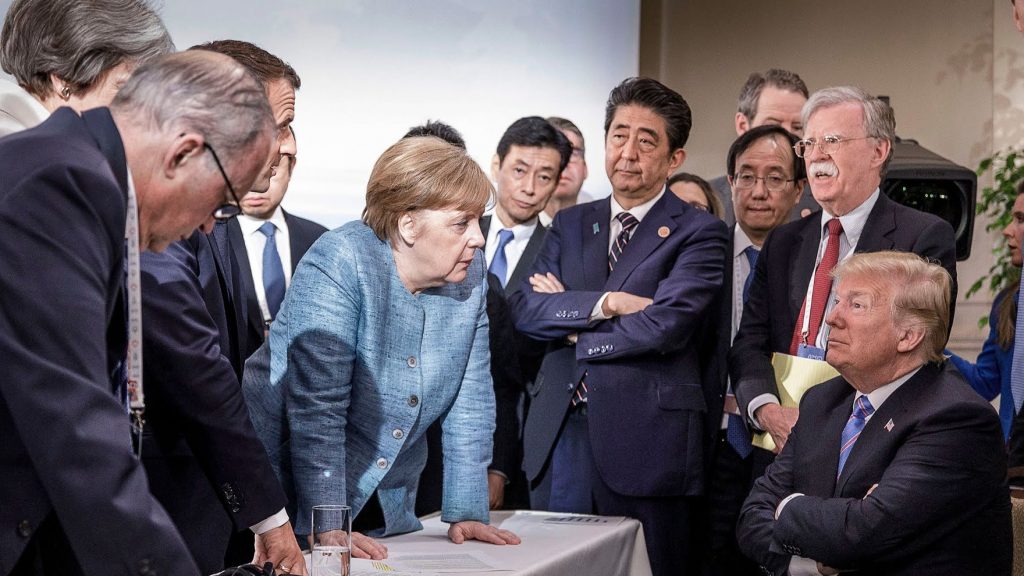 Germany Chancellor Angela Merkel confronting Donald Trump at a G-7 meeting in 2018
